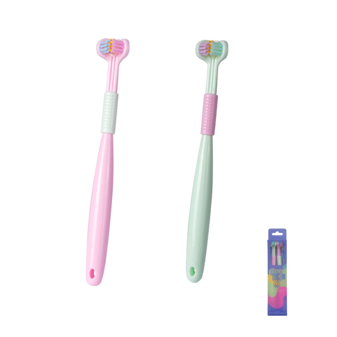 Two kids’ toothbrushes from Trio Teeth NZ, colorful and child-friendly with soft bristles for young children.
