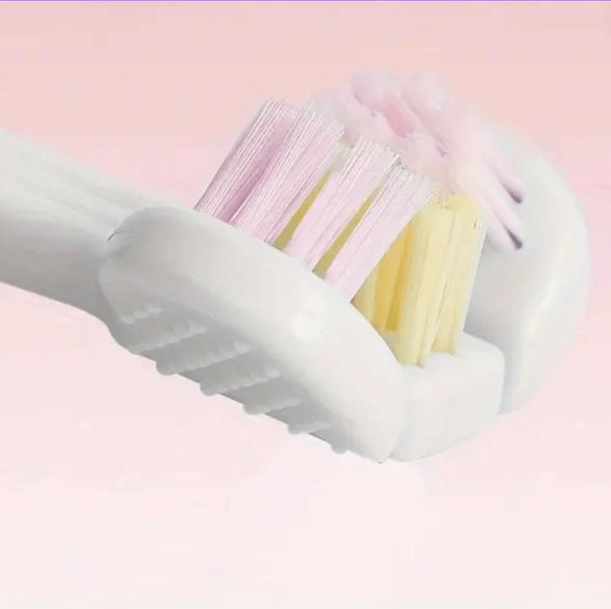 Three sided toothbrush head for kids close up