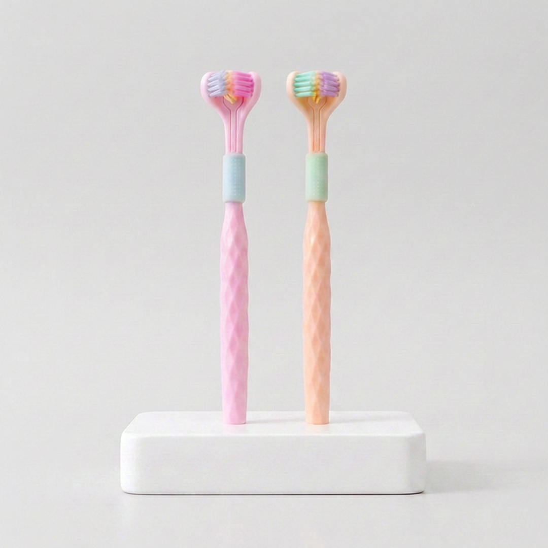 Two adult toothbrushes from Trio Teeth NZ featuring ergonomic handles and soft bristle heads for effective cleaning.