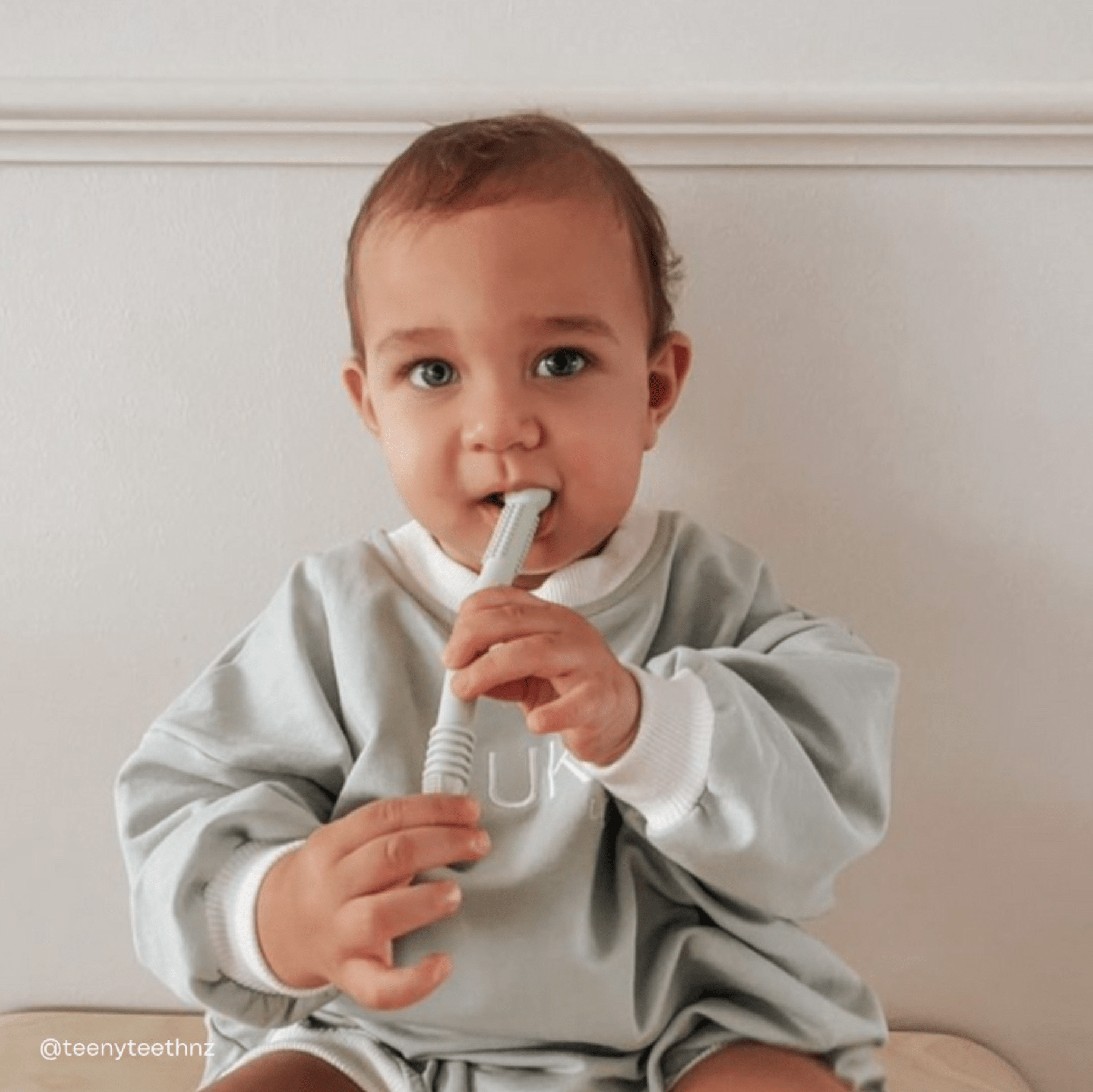 Set of four Teeny Teeth NZ teething tubes designed for toddlers, featuring colorful, textured silicone surfaces for soothing gums.