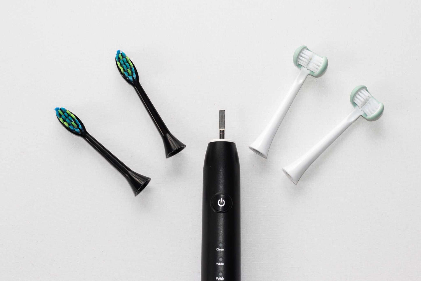 Adult electric toothbrush by Trio Teeth NZ with multiple cleaning modes, featuring a sleek design and ergonomic handle.