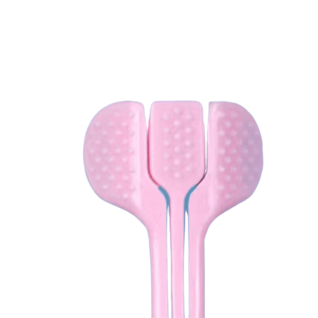 Close-up of two children's toothbrushes with colorful bristles from Trio Teeth NZ, showing the back of the toothbrush heads.