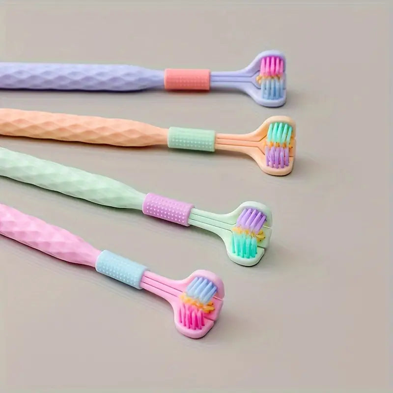 Close-up of Diamond Range adult toothbrush from Trio Teeth NZ, showing textured handle and soft bristle head in a 2-pack.