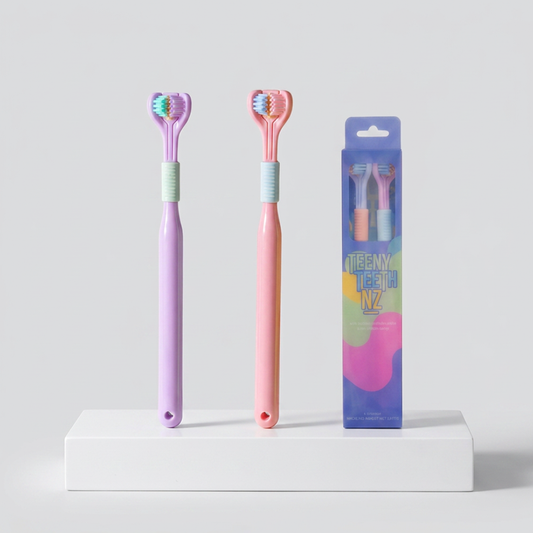Two Trio Teeth NZ Teens Toothbrushes with colorful handles and soft bristles, designed for effective teenage oral hygiene.